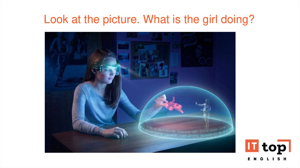 Look at the picture. What is the girl doing?