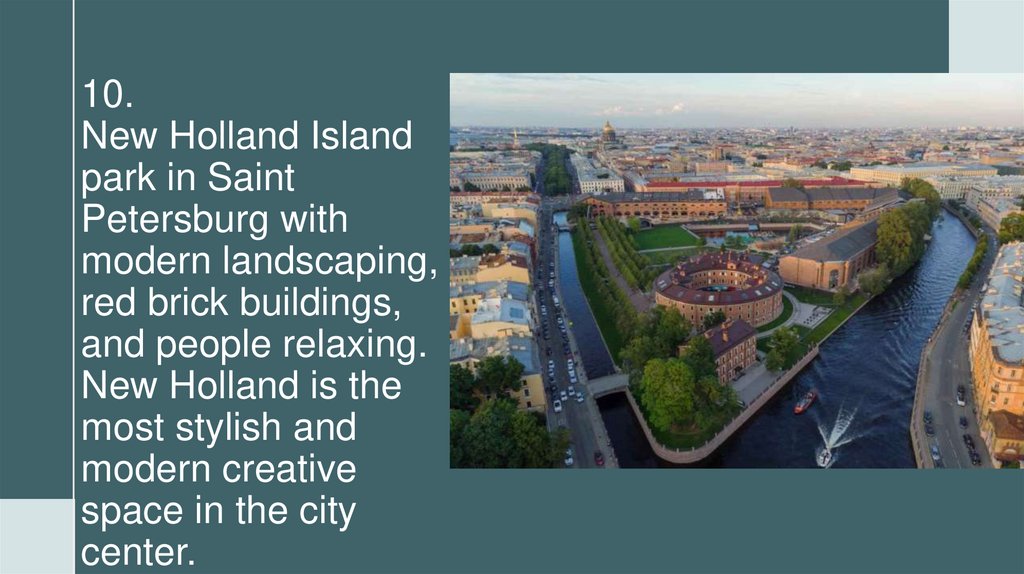 10. New Holland Island park in Saint Petersburg with modern landscaping, red brick buildings, and people relaxing. New Holland