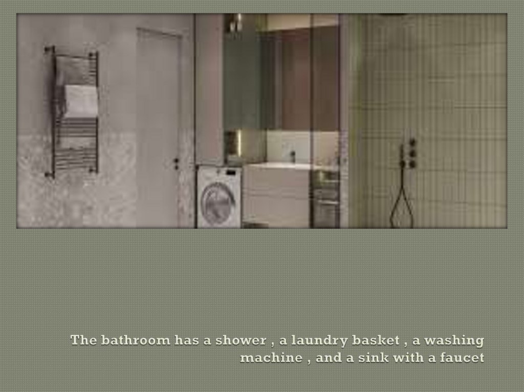 The bathroom has a shower , a laundry basket , a washing machine , and a sink with a faucet